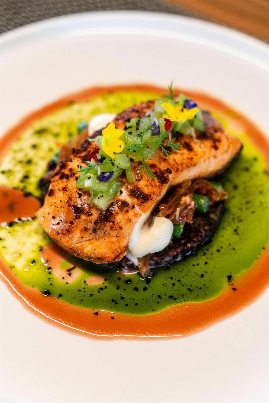 Seared fish on herb oil